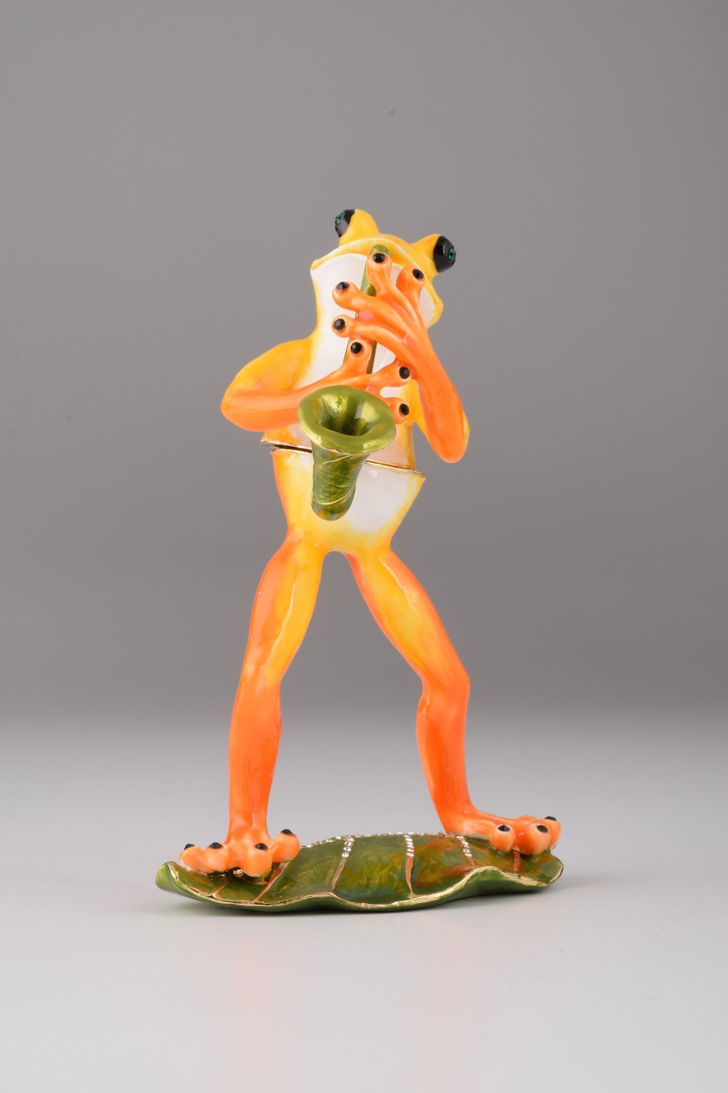 Keren Kopal Frog Playing a Saxophone