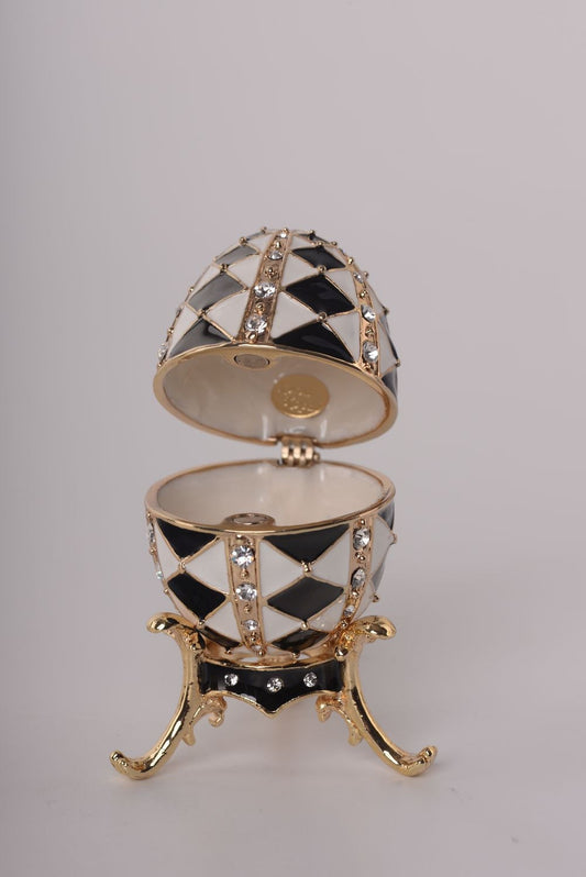 Keren Kopal Black and White Faberge Egg with Gold Necklace Inside